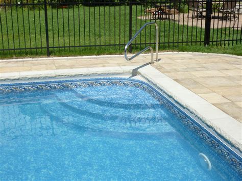 Clayton & Lambert vinyl liner pool with custom sundeck and steps