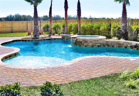 Geometric Swimming Pool With Baja Step, Bubblers, And Raised Outdoor