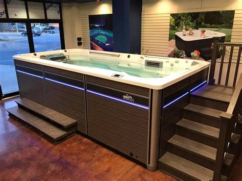 Watkins Endless Swim Spa with 5 tier steps, and Haindrail Small swim