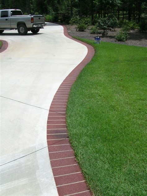 Gray Brushed Concrete Driveway with Decorative Borders with Holland
