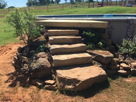 custom_pool_and_raised_spa_with_stacked_stone_spillway Artistic Pool