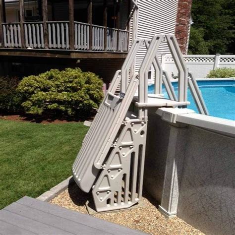 Exterior Dark Coleman Above Ground Pool Ladder from The Right Above