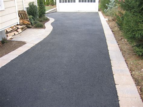 Asphalt driveway with Paver border and walkway Asphalt driveway