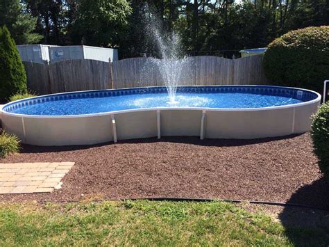 Radiant SemiInground Freeform with walkin steps and water feature