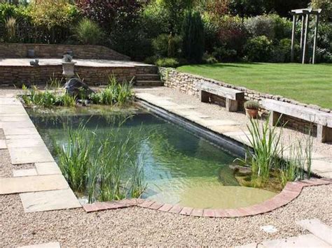 Home made pond for our little back yard. All you need is a kiddy pool